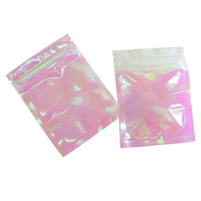 China Free Samples Moisture Proof Resealable Hologram Smell Proof Flat Bags Rainbow Color Holographic Mylar Wholesale Bags With Zipper for sale