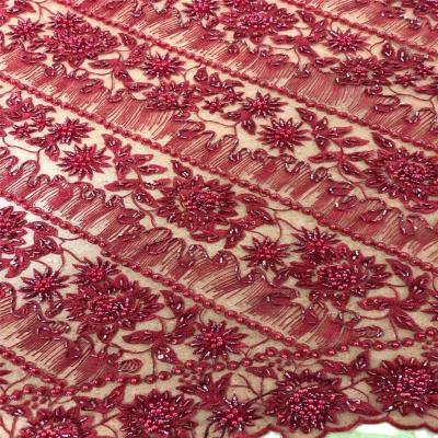 China Good Quality New Design Best Viable Selling Heavy Beaded Lace Fabric for sale