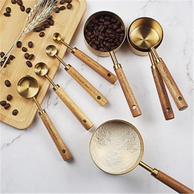 China Sustainable Acacia Handle Stainless Steel Wood Measuring Cup And Spoon Eight Piece Set Holding Scale Doser Bar for sale