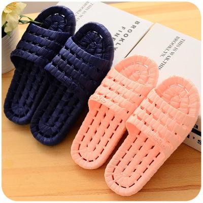 China EVA065 Lightweight Home Slippers Slips Flat Disjointed Bath Slippers Wholesale For Men Women Soft Bottom Couples Hollow Non Slip Bathroom for sale