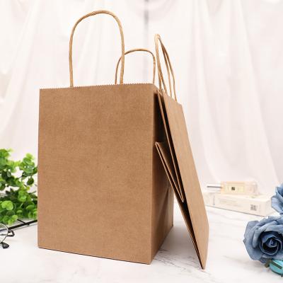 China El hacer compras de papel favorable al medio ambiente biodegradable empaqueta el 17*17*23cm en venta