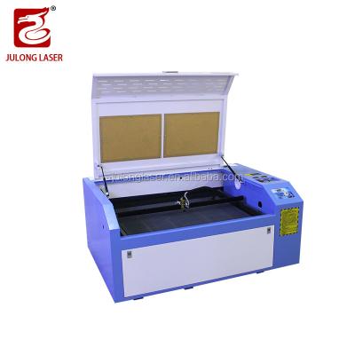 China Wholesale Water Cooled Engraving And China CNC CO2 Laser Cutting Machine For Wood Crystal Glass 60w 80w 100w for sale