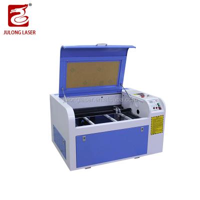 China China CNC Laser Cutting Machines 60cm*40cm Price Best Water Cooled Acrylic Laser Engraver Cutter 6040 for sale