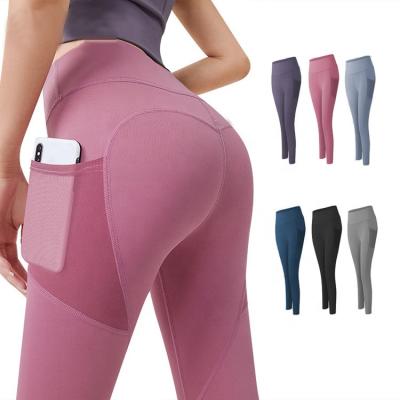 China Breathable Gym Butt Yoga Lifting Pants Stretch High Waist Workout Yoga Pants Gaiters With Pockets For Women for sale