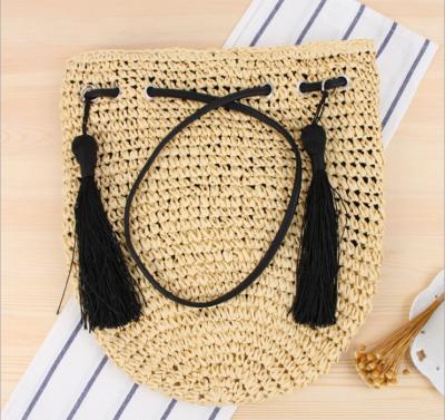 China Best Custom Knitted Large Capacity Tassel Bucket Straw Bag Custom Women Beach Bag Picnic For Summer for sale