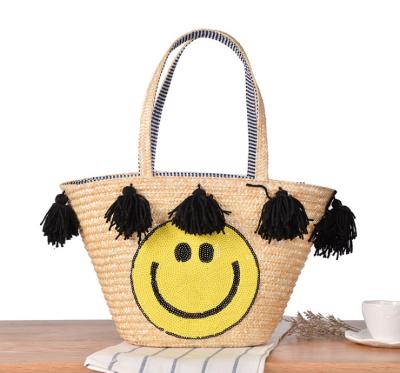 China Fashion Smile Face Tassel Style Summer Beach Straw Tote Bag For Women for sale