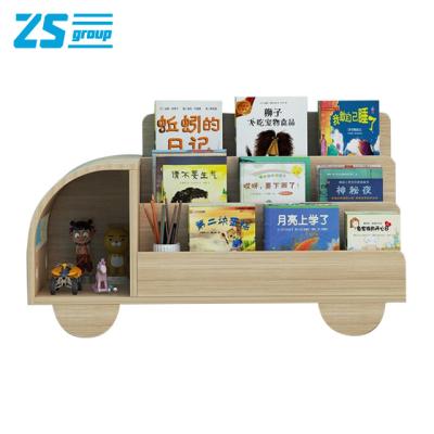 China Contracted Solid Wood Multi-Layer Floor Office Simple Household Picture Book Shelf Book Rack Truck (Warm White) for sale