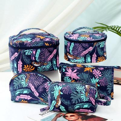 China Hot Selling Large Capacity Beautiful Makeup Bag Fish Tail Embroidery Bucket Storage Bag Color Laser Magic Makeup Bag For Women for sale