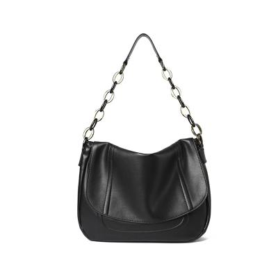 China Waterproof luxury real cowhide texture women handbag shoulder bag chain large capacity pure black stray bags for ladies for sale