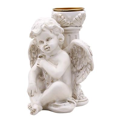 China Exquisite White Nosed Cupid Angel Candlestick Resin Garden Wedding Stage Shooting Props Decorative Ornaments for sale