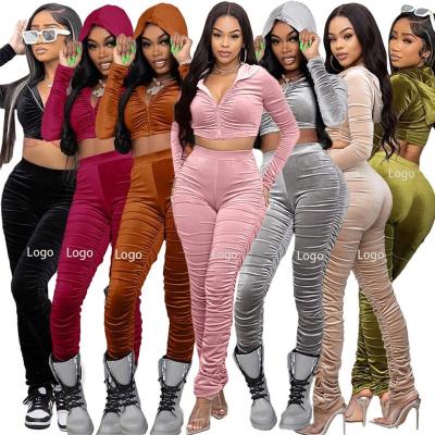 China Hot sale autumn ladies anti-pilling velvet set casual sheer velvet hooded long sleeve crop top women's two-piece set color pant set for sale