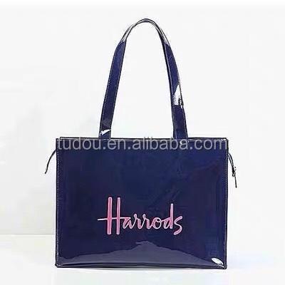 China Fashion Custom High Quality Logos PVC Shopping Bags Reusable Tote Bag Fashion Leather PVC Plastic Tote Bag for sale