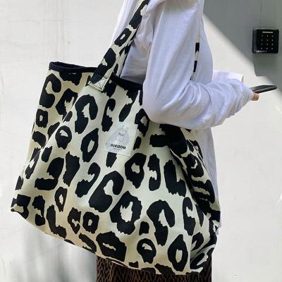 China Hot Sale Fashion Large Capacity Shoulder Bag Black Leopard Print Dumpling Bag Shopping Environmental Protection Bag Female for sale