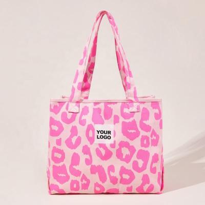 China Hot selling fashion large capacity spring shoulder bag pink leopard print dumpling bag shopping environmental protection bag female for sale