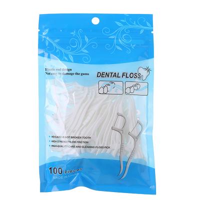 China Tooth Care Dental Floss Pick 50pcs/100pcs Eco-friendly Mint Flavored Biodegradable Dental Floss Pick for sale