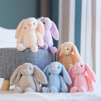 China Stuffed Toys Plush Toys Lay Bunny Color Stuffed Soft Bunny Long Ear Flower 25cm Easter Bunny Stuffed Animal Plush Toy for sale