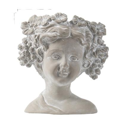 China Nordic minimalist cement head statue decoration luxury vase for sale