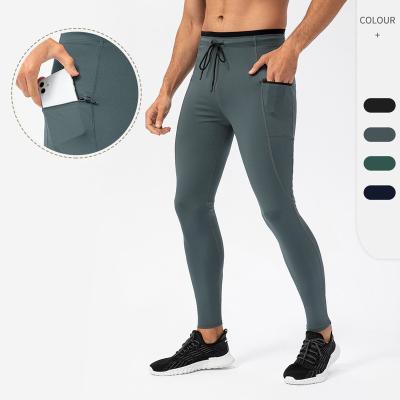 China Custom Logo Antibacterial Gaiters Fitness Jogger Quick Dry Gym Logo Men Compression Pants Running Pants Zipper Side for sale