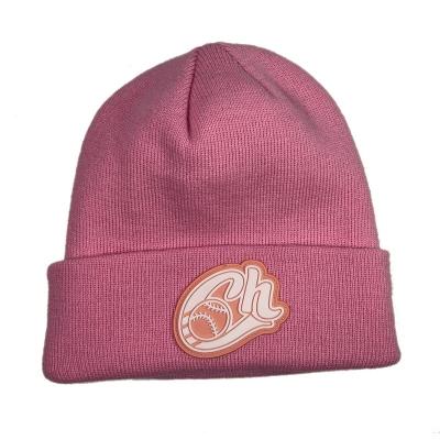 China Winter COMMON high quality acrylic women kint pink hat OEM custom logo beanie with rubber patch for sale