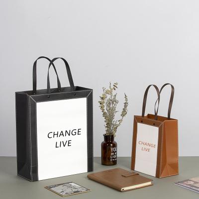 China Recycled Materials Printed Gift Paper Shopping Bag Jewelry Paper Bag Luxury Special Creative Packaging Paper Bags for sale