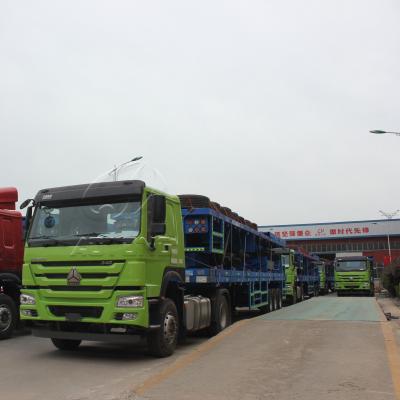 Cina 3 assi a letto piatto 40ft container camion rimorchio con serrature a torsione e carico utile massimo 50t in vendita