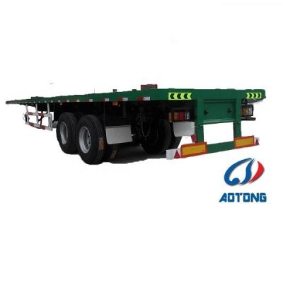 China 40ft Flatbed Semi Trailer with 12 Container Locks in Ghana Double Axle Steel Trailer for sale