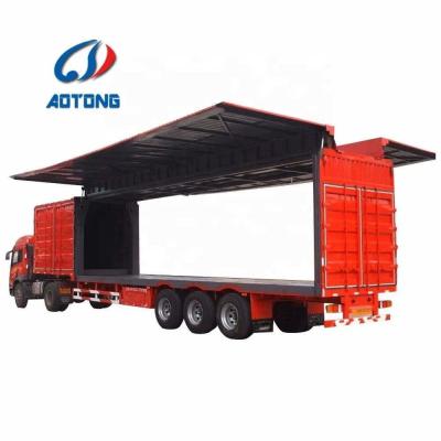 China 11000*2500*1500 Truck Trailer 3 axles Box Cargo Truck Wing Van Opening Semi-trailer Te koop