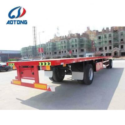 China Aotong 2 of 3 assen Container trekband Volle platbed aanhangwagen voor het vervoer van zand Te koop