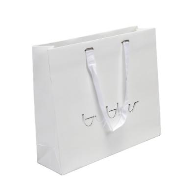 China Eco-friendly Recycled Materials White Romantic Shopping Paper Bag Customized With Handle for sale