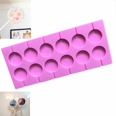 China Sustainable Cavity Silicone Round Lollipop Mold DIY 12 Chocolate Mold With Plastic Stick for sale