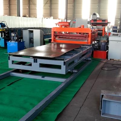 中国 Building Material Shops Embossing Leveling And Slitting Metal Sheet Roll Forming Machine Leveling And Slitting Roll Forming Machine 販売のため