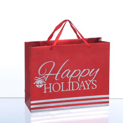 China Recycled Materials Laser holographic  gift freeting Shopping Paper Bag for sale