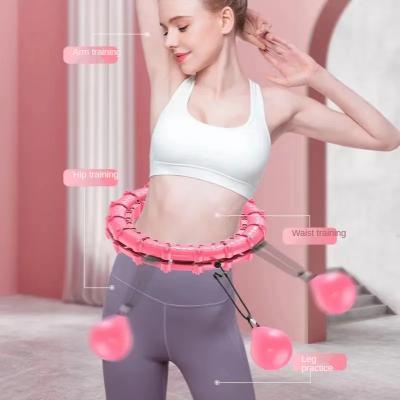 China Fitness Equipment Exercise Gym Equipment Polynesian Dance Ring Plastic Weighted Circle With Ball for sale