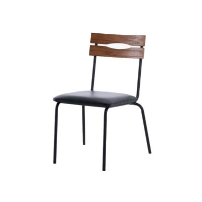 China Modern Royal Cushion PVC Leather Black Metal Legs Dining Chair for sale