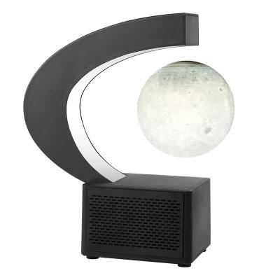 China 2021 New Design ABS/PP 2021 New Product Magnetic Levitation C Shape Bass Speaker Levitating Moon Lamp for sale