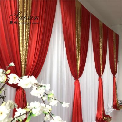 Cina Hot sale wedding backdrop double drape red curtains cross valance in vendita