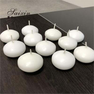 中国 Hot sale 4.5cm real wax water activated floating candles for wedding decoration centerpiece candle holders 販売のため