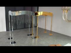 Shiny gold or silver wedding centerpieces metal stand