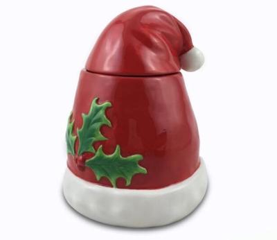 China Hand Painted Dolomite Santa Hat Canister Ceramic Santa Claus Cookie Jar Wholesale Christmas Food Storage Safe Jar for sale