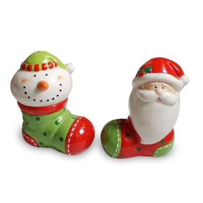 China Sustainable Christmas Salt And Pepper Shaker Salt And Pepper Shakers In Boot Shaped Santa And Snowman Design for sale