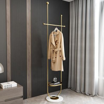 China Modern Light Luxury Bedroom Living Room Floor Rack Marble Coat Hanger Metal Clothes Hanger Modern Minimalist Hat Rack for sale