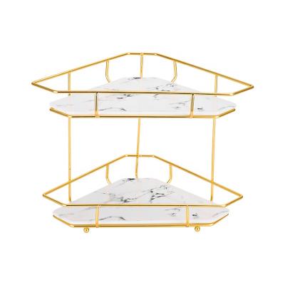 China Sustainable Cosmetic Organizer Double Layer Display Rack Triangle Bathroom Metal Storage Rack for sale