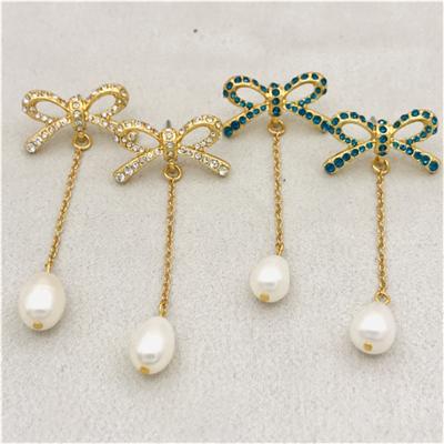 China Cute Euramerican Feeling Bowknot Design Long Niche Pearl Zircon Stud Earrings Freshwater Stud Earrings for sale