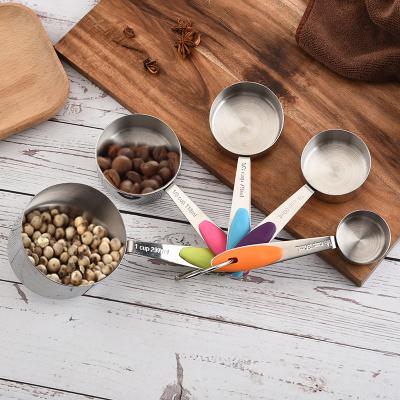 China Sustainable Wholesale Kitchen Tool 5-piece set Stainless Steel Measuring Spoon Colored Silicone Handle for sale