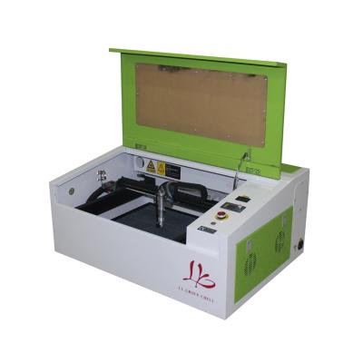 China Mini Laser 300*400mm Engraving Cutting Machine 3040 CO2 40W Laser Engraver with Control Panel Board and LCD Honeycomb USB Port for sale