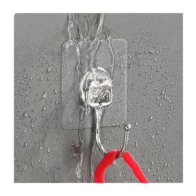 China Cheap Strong Clear Plastic Towel Hanger Hook Stocked Adhesive Sticker Wall for sale