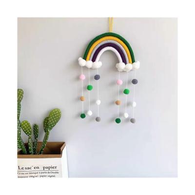 China Minimalist Room Decoration Handmade Woven Cotton Rope Rainbow Wall Hanging Decor With Felt Ball Wall Hanging for sale