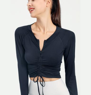 China Women Breathable Slim Fit Yoga Long Sleeve Shirt Crop Top With Front Zipper And Elastic Gather for sale