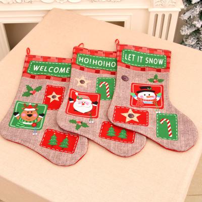 China Durable Christmas Stockings Set Of 3 Santa Snowman Reindeer Xmas Character Canvas Snowflake Applique Embroidered Christmas Socks for sale