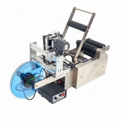 China MT-50 Small Food Glass Plastic Beverage Printing Sticker Bottles Label Semi Automatic Round Bottle Labeling Machine With Printer for sale